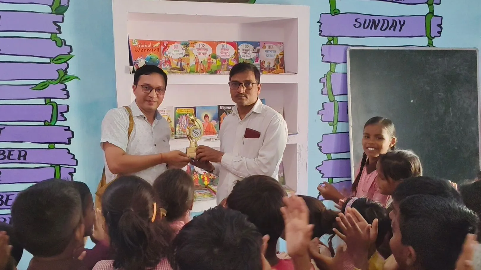 SSF Team presenting momento to school administration